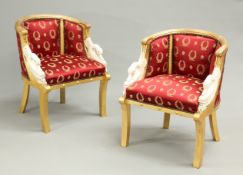 A PAIR OF REGENCY STYLE GILDED AND PAINTED ARMCHAIRS