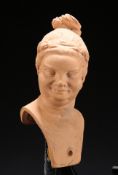 A TERRACOTTA HEAD OF A MATRONA