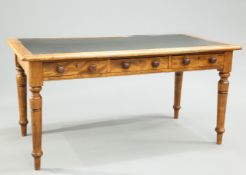 A VICTORIAN OAK AND SATIN BIRCH WRITING TABLE