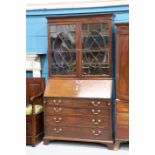 A GEORGE III MAHOGANY BUREAU BOOKCASE