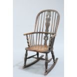 AN ELM AND OAK WINDSOR ROCKING CHAIR