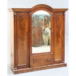 A VICTORIAN MAHOGANY THREE-DOOR WARDROBE