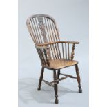 AN ELM AND OAK HIGH-BACK WINDSOR ARMCHAIR