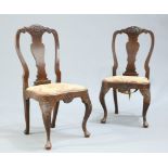 A PAIR OF GEORGE I STYLE CARVED OAK SIDE CHAIRS