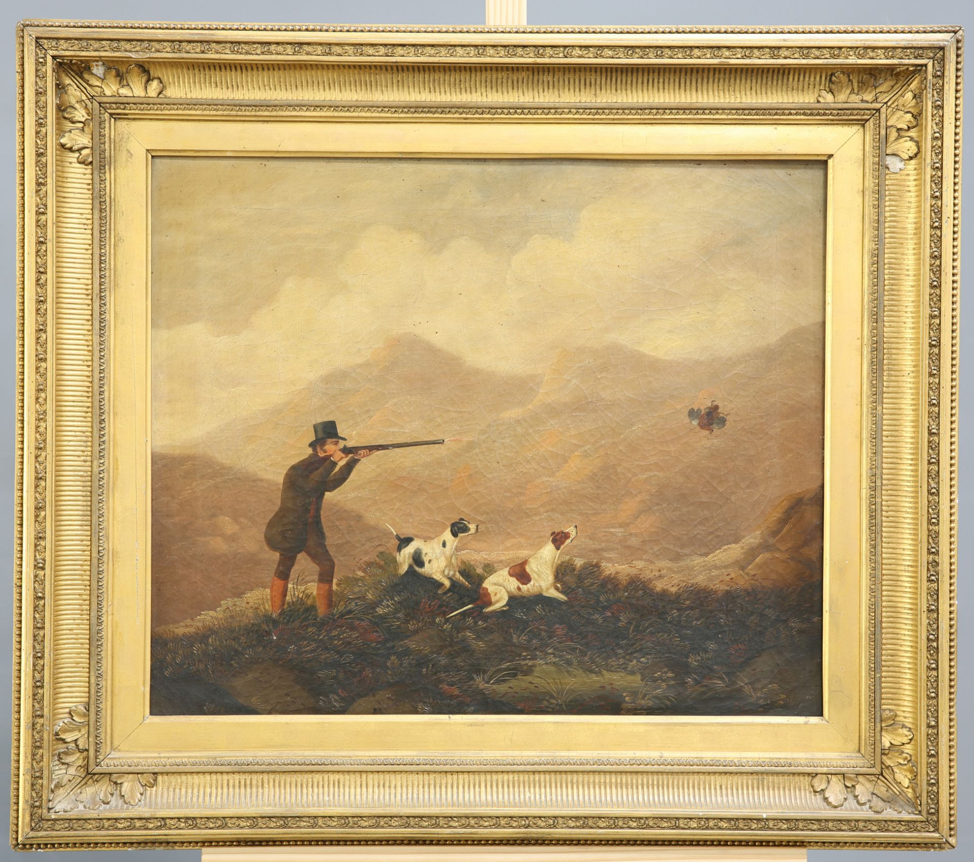 ENGLISH SCHOOL (18TH CENTURY), A SPORTSMAN AND HIS DOGS IN A LAKELAND LANDSCAPE, A PAIR, oil on