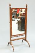 A REGENCY MAHOGANY CHEVAL MIRROR