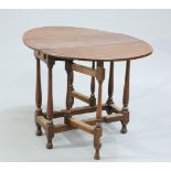 A SMALL OAK GATELEG TABLE