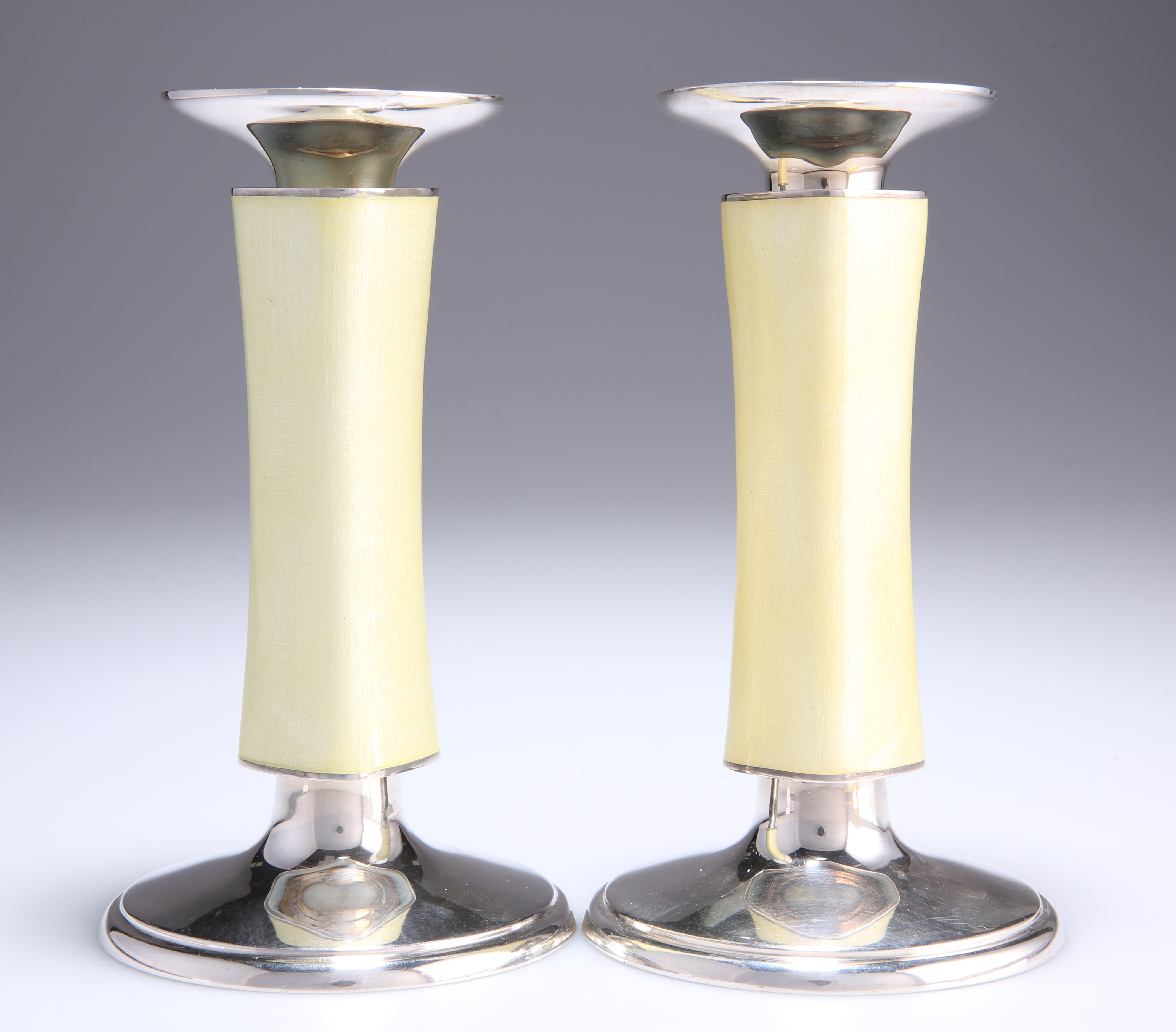 MEISTER, ZURICH, A PAIR OF SWISS SILVER AND ENAMEL CANDLESTICKS, CIRCA 1960