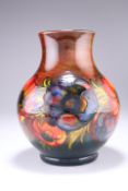 WILLIAM MOORCROFT AN ANEMONE PATTERN FLAMBE TUBE LINED POTTERY VASE