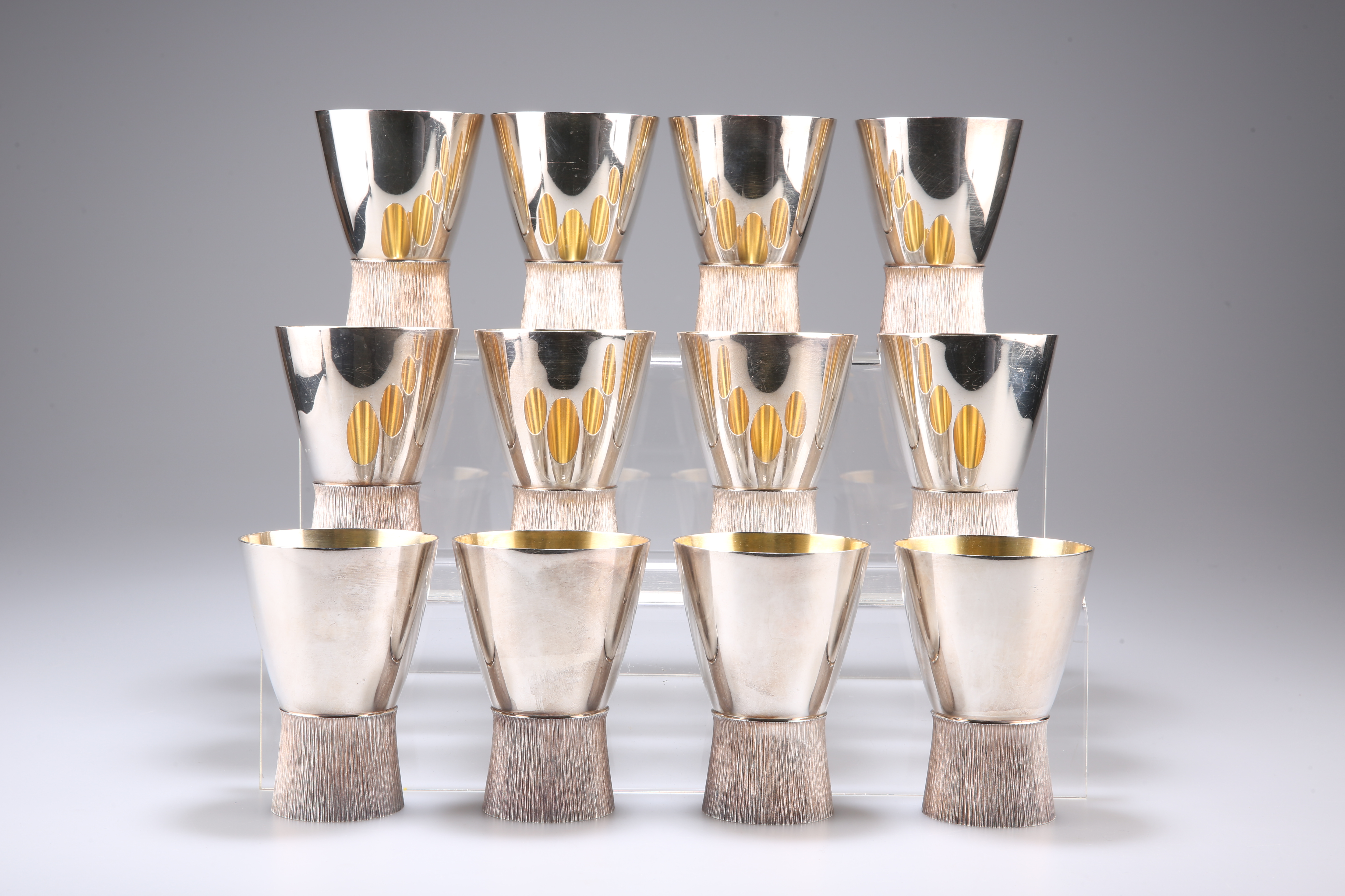 BRIAN LESLIE FULLER (1937-2009) A SET OF TWELVE ELIZABETH II SILVER GOBLETS