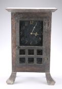 AN AMERICAN ARTS AND CRAFTS OAK MANTEL CLOCK