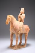 A CHINESE POTTERY HORSE AND RIDER