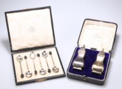 A PAIR OF GEORGE V SILVER PEPPER POTS