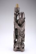 A CHINESE CARVED HARDWOOD FIGURAL LAMP BASE