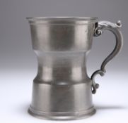 AN UNUSUAL PEWTER TANKARD