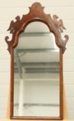 A QUEEN ANNE STYLE WALNUT FRETWORK MIRROR