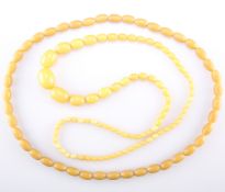 TWO YELLOW PLASTIC BEAD NECKLACES