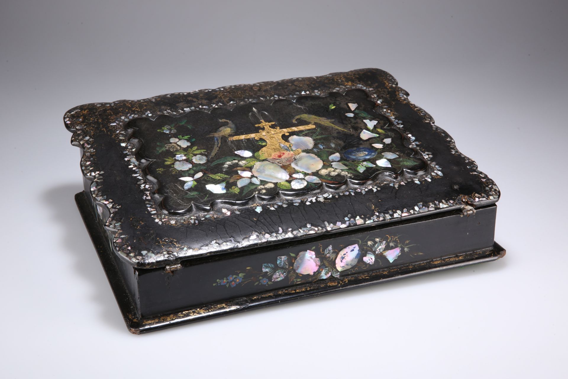A MOTHER OF PEARL INLAID BLACK LACQUER WRITING SLOPE