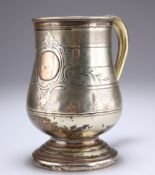 A LARGE SILVER-PLATED MUG