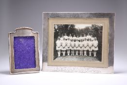 TWO SILVER-MOUNTED PICTURE FRAMES