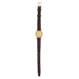 A LADY'S GOLD PLATED OMEGA STRAP WATCH