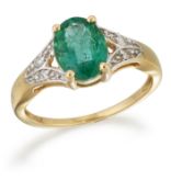 AN 18 CARAT GOLD EMERALD AND DIAMOND RING