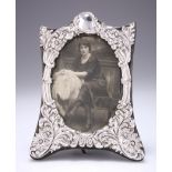 AN ART NOUVEAU SILVER-MOUNTED PHOTOGRAPH FRAME