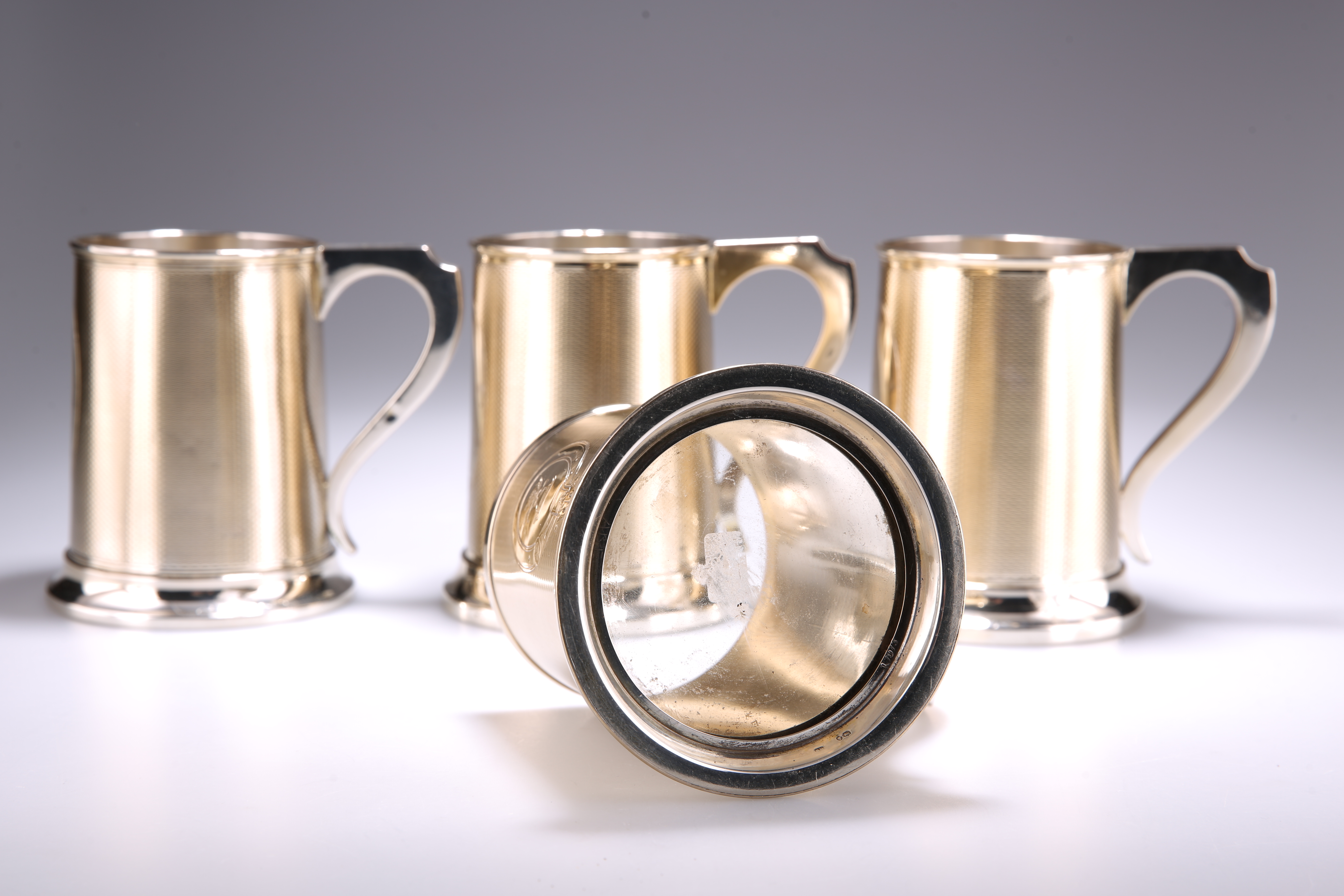 A HARLEQUIN SET OF FOUR VICTORIAN SILVER-GILT PINT MUGS - Image 3 of 5