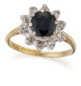 AN 18 CARAT GOLD SAPPHIRE AND DIAMOND CLUSTER RING