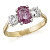 AN 18 CARAT GOLD PINK SAPPHIRE AND DIAMOND THREE-STONE RING