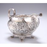 A GEORGE IV IRISH SILVER CREAM JUG