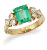 AN EMERALD AND DIAMOND RING