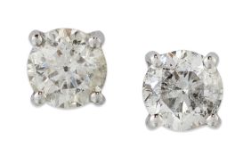 A PAIR OF DIAMOND SINGLE-STONE STUD EARRINGS