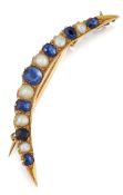 A VICTORIAN SAPPHIRE AND SPLIT PEARL CRESCENT BROOCH