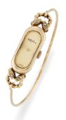 A LADY'S 9 CARAT GOLD ROY KING BANGLE WATCH