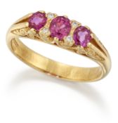 AN 18 CARAT GOLD RUBY AND DIAMOND RING