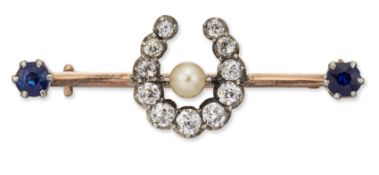 AN EARLY 20TH CENTURY SAPPHIRE, PEARL AND DIAMOND HORSESHOE BROOCH