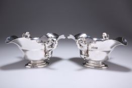 A HANDSOME PAIR OF GEORGE II STYLE SILVER DOUBLE-LIPPED SAUCEBOATS