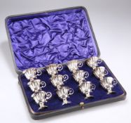 A SET OF TWELVE ITALIAN SILVER TOT CUPS