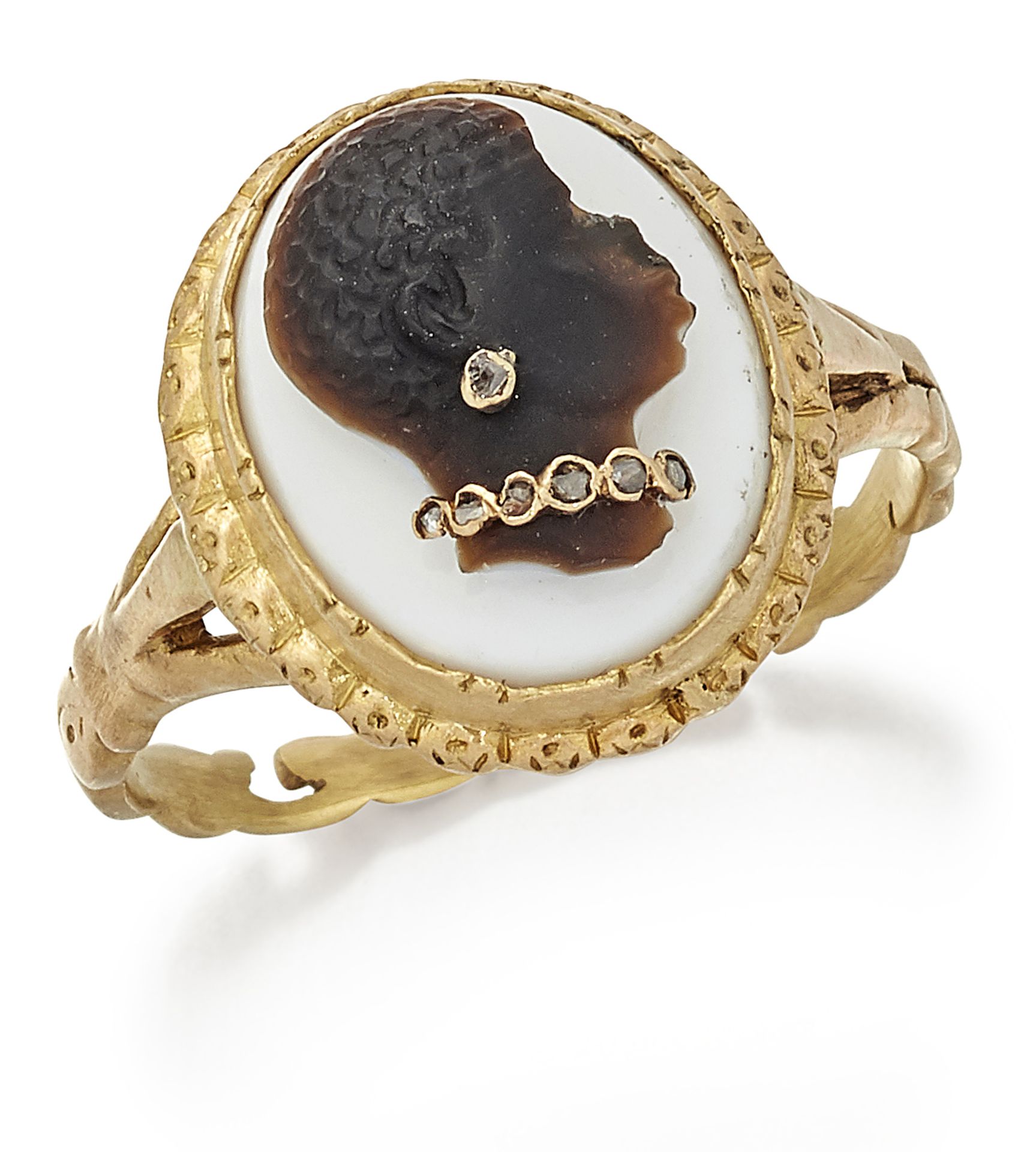 A CARVED HARDSTONE CAMEO HABILLÉS RING