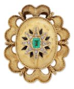 AN EMERALD, DIAMOND AND BLACK ENAMEL BROOCH