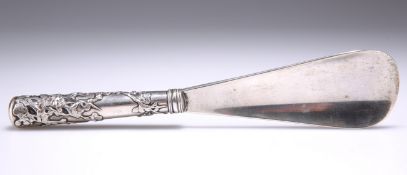 A CHINESE SILVER-HANDLED SHOE HORN