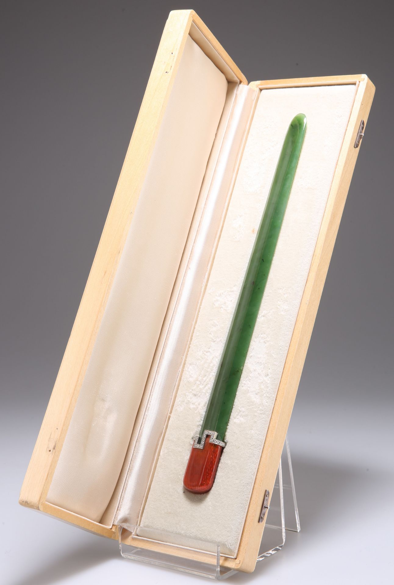 AN ART DECO NEPHRITE, ENAMEL AND DIAMOND PAGE TURNER