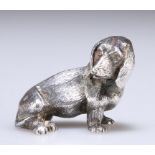 AN ELIZABETH II SILVER NOVELTY MODEL OF A DOG