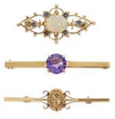 THREE 9 CARAT GOLD BROOCHES