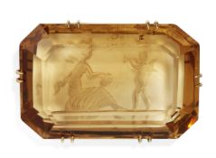 A CITRINE REVERSE INTAGLIO BROOCH