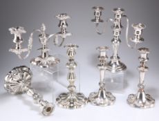 A GROUP OF SILVER-PLATED CANDLESTICKS AND CANDELABRA