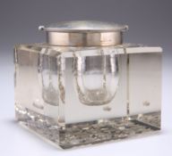A GEORGE V SILVER MOUNTED GLASS INKWELL