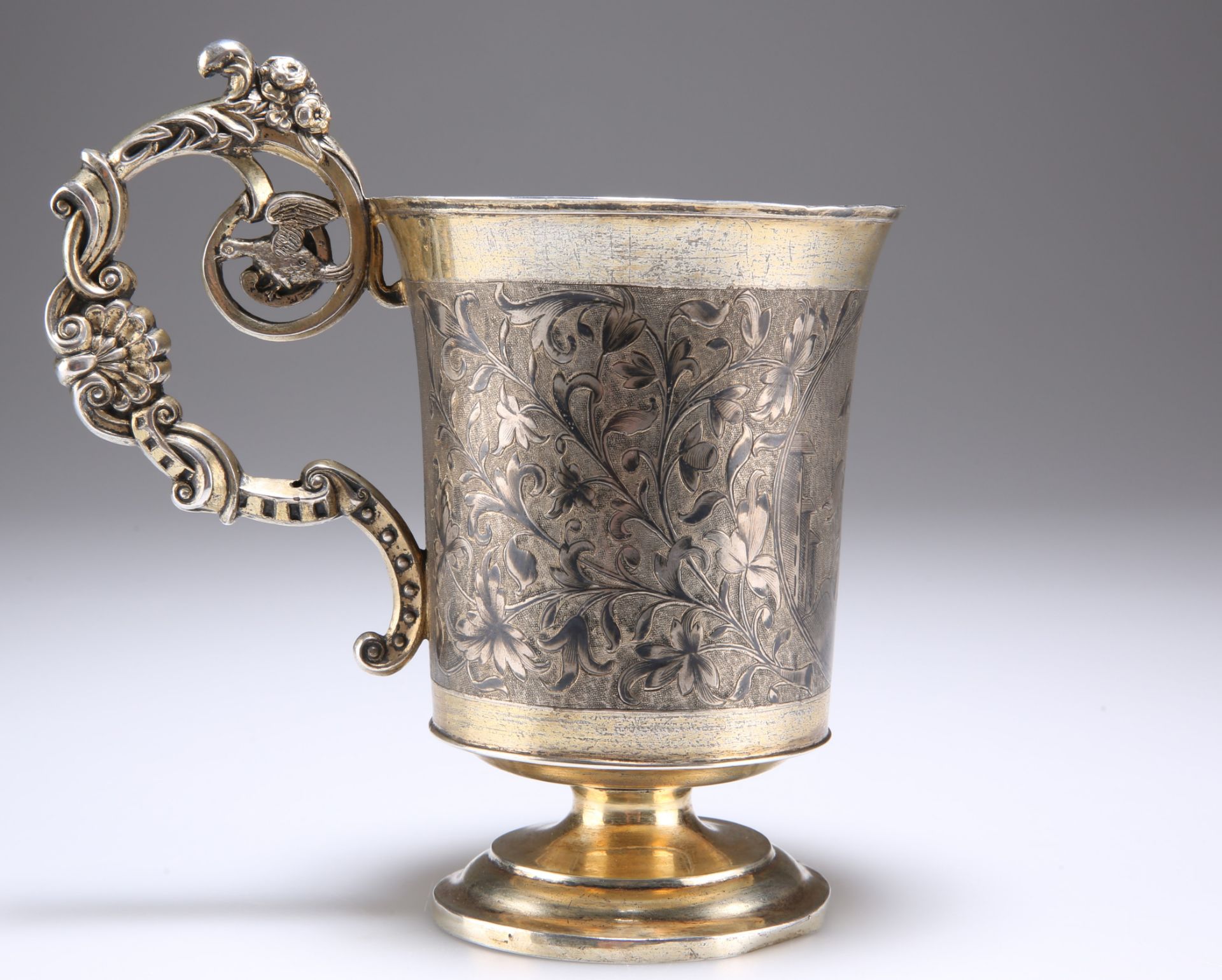 A RUSSIAN SILVER-GILT AND NIELLO CUP OF THE BRONZE HORSEMAN