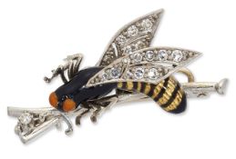 A NOVELTY DIAMOND AND ENAMEL WINGED INSECT BROOCH